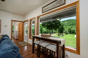 Enchanting Riverside Cabin Retreat with Mountain Views near Sardis Lake Oklahoma - Image 4
