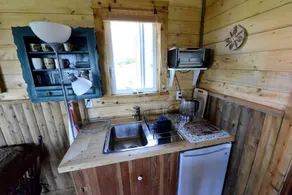 Cheerful Victoria Beach Cabin Rental Ideal for Glamping in Nova Scotia - Image 3