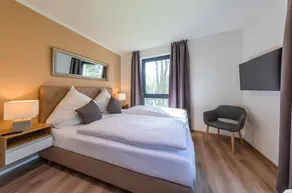 5 Sterne Ferienapartment „Honigbiene“ mit seitlichem Blick auf den Krakower See - Image 5