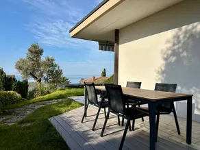 Fully equipped charming holiday home with terrace, hot tub & garden | Lake view | Next to the beach - Image 2