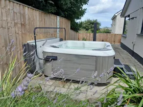 Cottage with barbecue, terrace & hot tub | Water view - Image 4