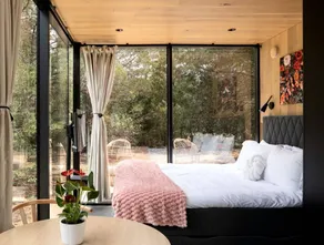 Whimsical Flower-Inspired Mirror Cabin by the Lake in the Enchanted Forests of Texas - Image 4