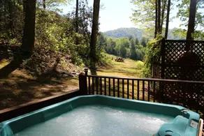 Holiday home with jacuzzi, garden & fast internet | Water view - Image 2