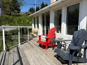 Coastal Retreat with Bay Views & Wraparound Deck in Nova Scotia, Canada - Image 5