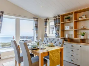 Lodge with pool & garden | Water view - Image 2