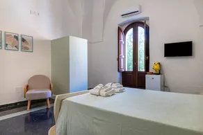 Room 'Primo Piano - Camera 1' with Private Garden, Wi-Fi and Air Conditioning - Image 2