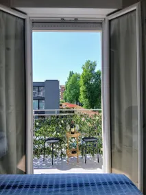 Agréable appartement de vacances avec terrasse | Vue ville - Image 3