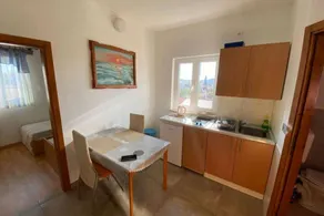Apartamento vacacional con jardín, terraza y barbacoa - Image 5