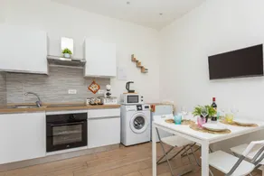 Maravilloso apartamento vacacional apropiado para familias con internet de alta velocidad y terraza | Cerca Castillo Ursino | Vistas a la ciudad | Acepta mascotas - Image 4