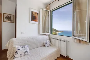 Agréable appartement de vacances avec terrasse, piscine et jardin | Vue mer | À côté de la plage | Avec animaux bienvenus - Image 4