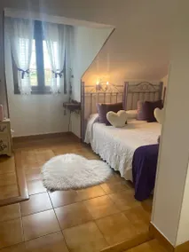 Double Violeta Room with Mountain Views, Shared Terrace, and Wi-Fi - Image 4