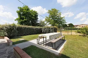 Il Girasole Apartment: Accessible Comfort and Relaxation in a Private Garden - Image 2