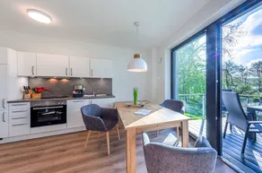 5 Sterne Ferienapartment „Honigbiene“ mit seitlichem Blick auf den Krakower See - Image 3