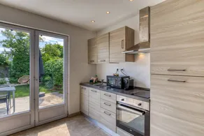 Holiday apartment with garden, terrace & barbeque | Garden view - Image 5