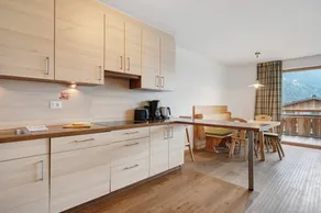 Schöne Wohnung mit Pool, Sauna und Garten | Bergblick - Image 4