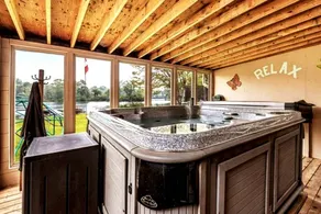 Waterfront Family Cottage with Hot Tub on Gull River, Ontario - Image 2