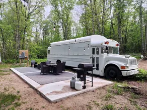 Rustic Converted School Bus with Outdoor Shower Near ORV Trails in Manistee National Forest, Michigan - Image 2