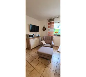 Nice holiday apartment with heated pool, garden & barbeque | Garden view | Good for workation | Dogs allowed - Image 4