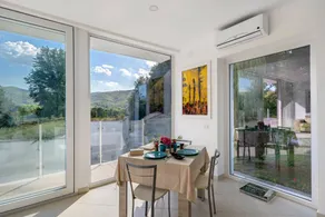 Gemütliches Apartment mit beheiztem Pool, Terrasse und Garten | Seeblick - Image 3