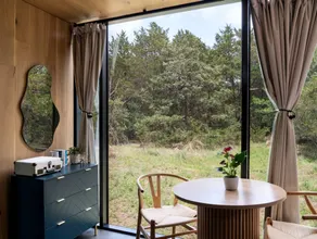 Whimsical Flower-Inspired Mirror Cabin by the Lake in the Enchanted Forests of Texas - Image 2