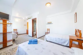 Room 'Habitación Triple' with Wi-Fi and Air Conditioning - Image 5