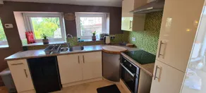 Cozy 1-bed flat with open kitchen, spacious living room, and bathroom with shower and bath. Perfect for comfort and relaxation. - Image 4