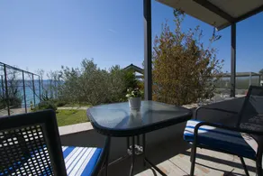 Pleasant holiday apartment with terrace, BBQ & garden | Garden view | Next to the beach - Image 2