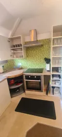 Cozy 1-bed flat with open kitchen, spacious living room, and bathroom with shower and bath. Perfect for comfort and relaxation. - Image 5
