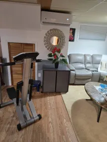Serene Basement Retreat with Shared Pool Access in Sainte-Catherine - Image 4