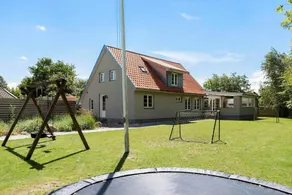Holiday home with terrace, sauna & hot tub | Next to the beach - Image 2