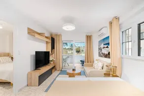 Holiday apartment with terrace, pool & garden | Close to Torre del Moro | Garden view - Image 4