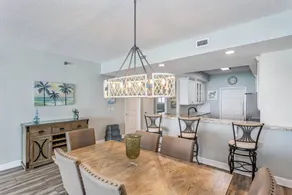 Appartement en copropriété adapté aux familles avec piscine et barbecue | Vue sur l'eau | Proche de la plage - Image 2