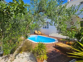 Pool house with exotic garden - Image 2