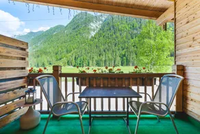 Mountain View Deluxe: Enjoy mountain views together, a balcony, and alpine luxury. Perfect for a romantic stay in summer or winter. - Image 4