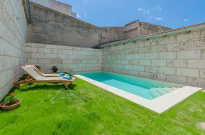 Child-friendly villa with terrace, garden & private pool - Image 4