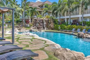Appartement en copropriété avec piscine chauffée, jardin et jacuzzi | Vue jardin - Image 4