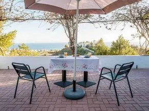 Apartamento vacacional con terraza, barbacoa y jardín | Vistas a la playa - Image 3