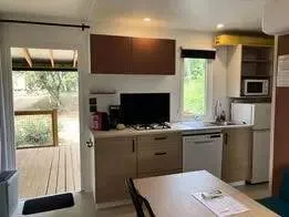Mobile home with terrace, heated pool & garden - Image 4