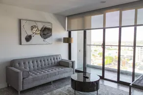 Urban 1BR Balcony at Distrito Revolucion 905 - Image 3