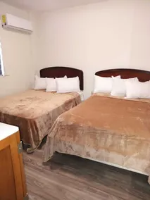 Capital O Baja Place Inn - Image 3