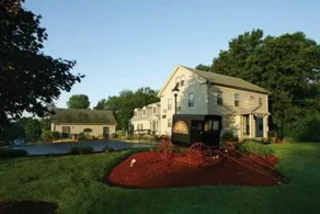 Centennial Inn Hotel & Apartments - Image 1