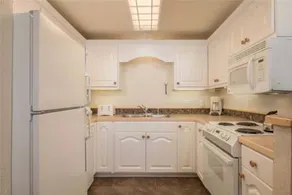 Four Seasons Condominiums - Image 4