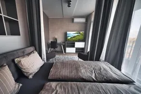 Fitness Parking & Security Children's Playground Air Conditioner Kitchen & Washing Machine 4k Oled TV & Highspeed Wifi Spacious Balcony with Gorgeous City View in Central Location - Image 2