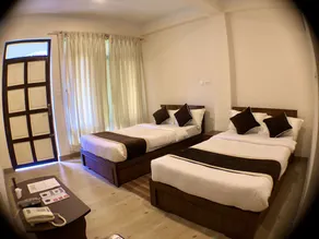 OYO 242 Hotel Satyam - Image 5