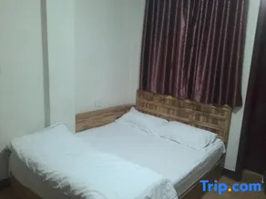 Xintai Jujia Hotel - Image 4