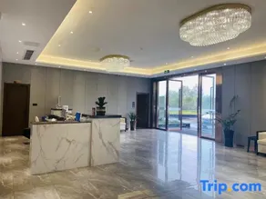 Xinqi Zhouji Hotel - Image 4