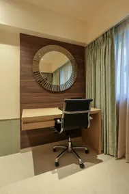 OYO Premium Navi Mumbai Palm Beach Road - Image 2
