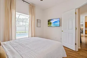 WHISPERING PALM Newly renovated cozy fenced in pool home sleeps 8 - Image 5
