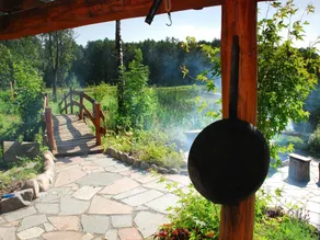 Rustic Riverside Cabin in Forest - Image 4