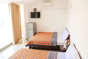 OYO 128 Avy Hotel - Image 3